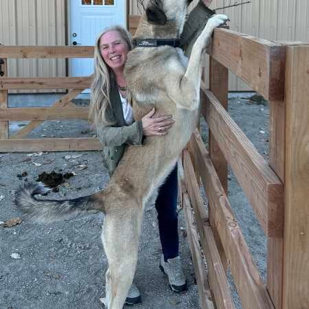 Snoozer customer with her livestock guardian dog